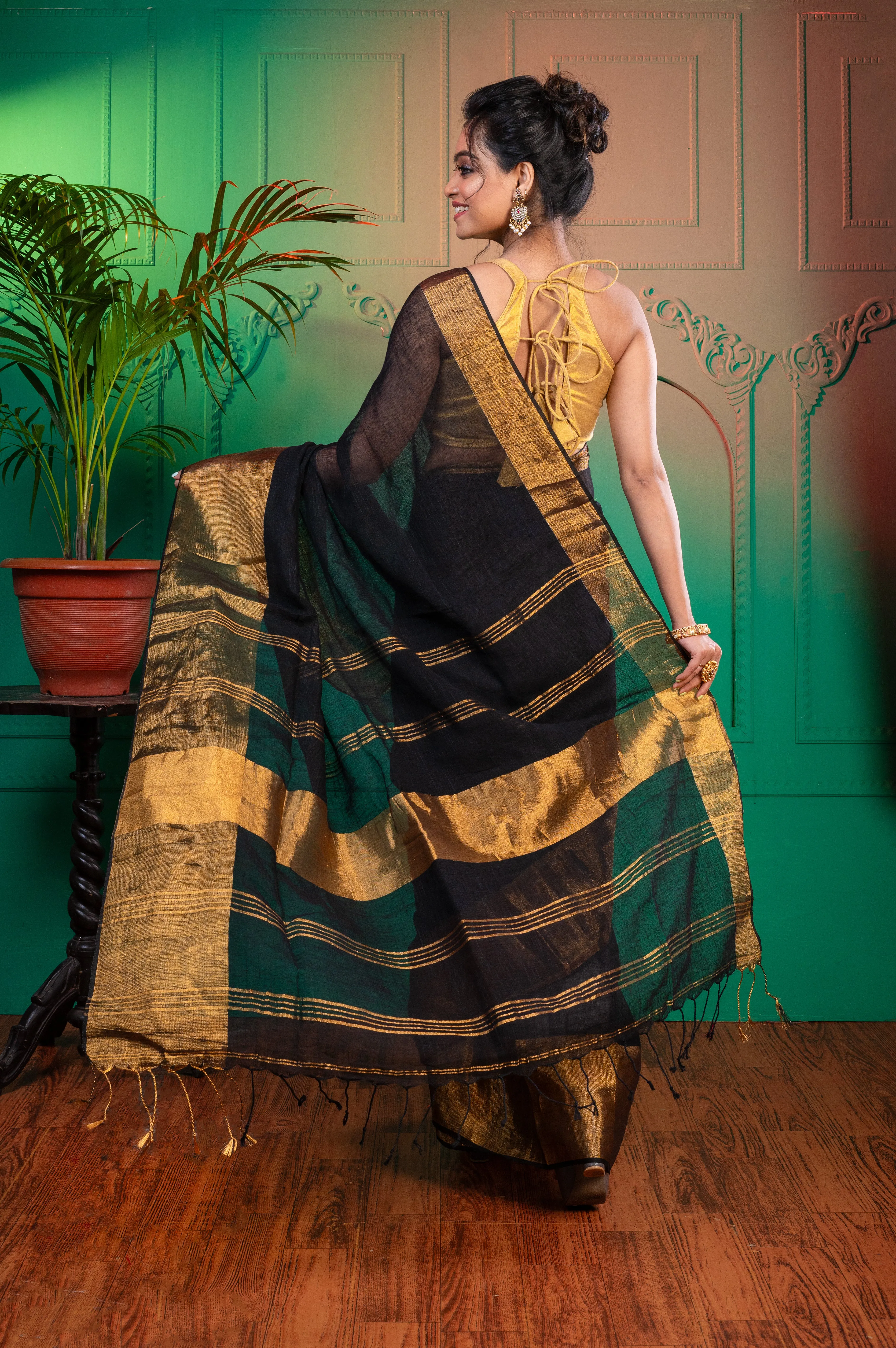 Women Black Pure Handloom Linen Saree With Golden Zari  Border And Pallu